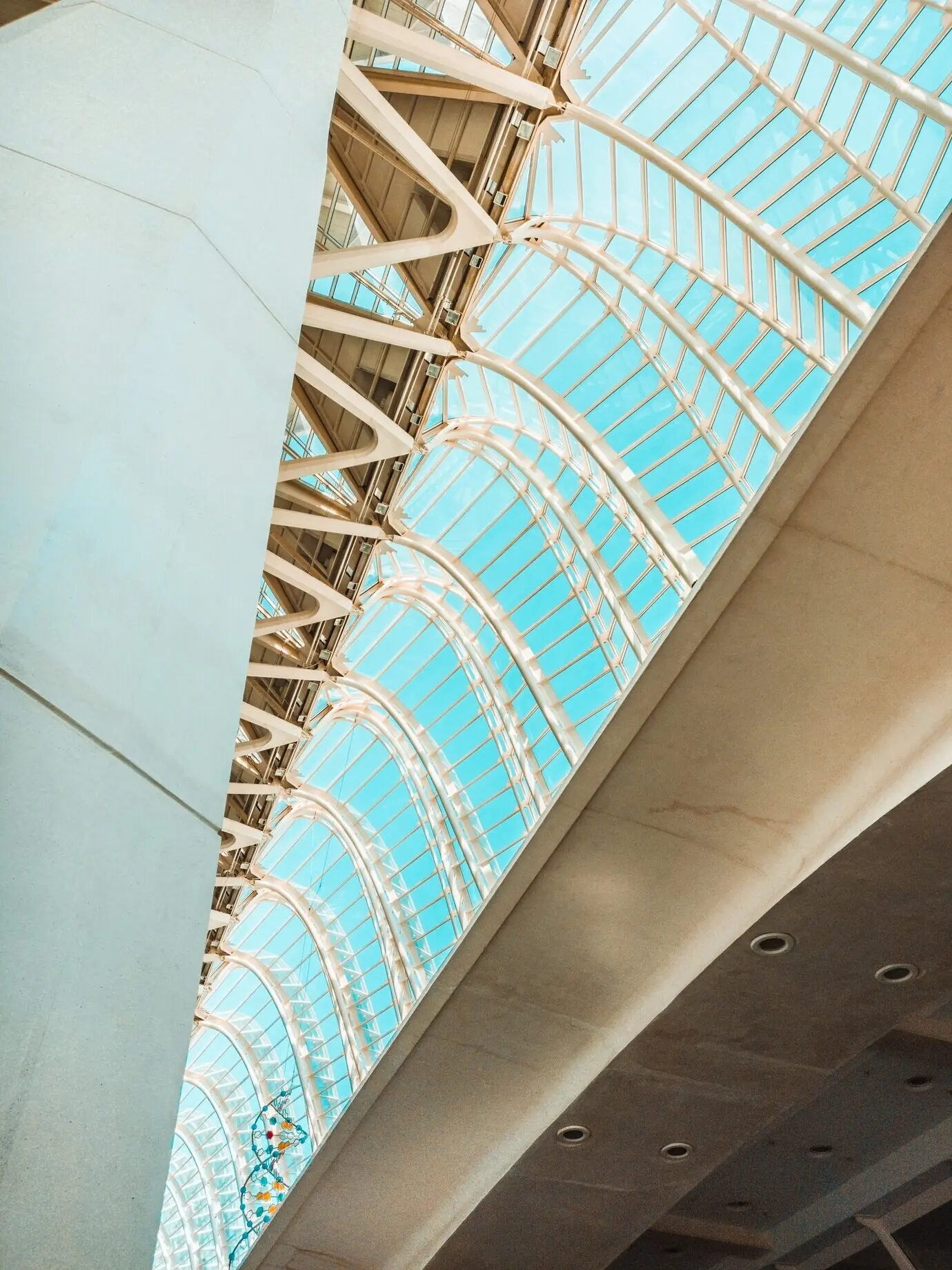 Low-angle photograph of a glass ceiling